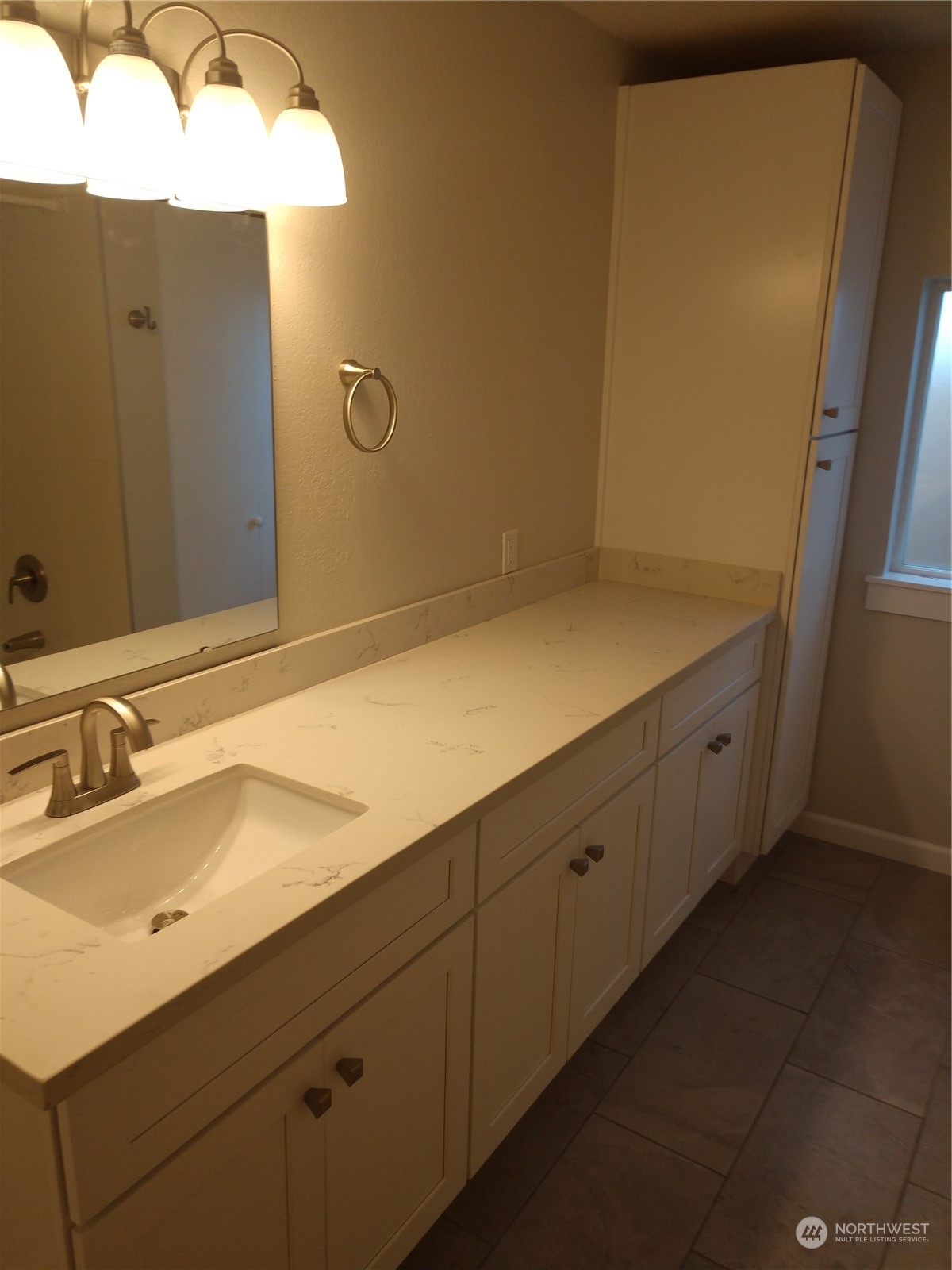 1902 Rockefeller Avenue Everett, WA 98201 - Photo 12 of 17 a bathroom with a sink and a mirror