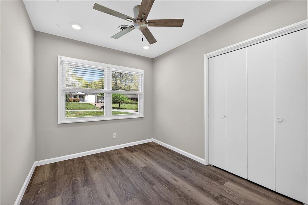 3045 Lindon Lane Decatur, GA 30033 - Photo 13 of 18 a view of an empty room with wooden floor and a window