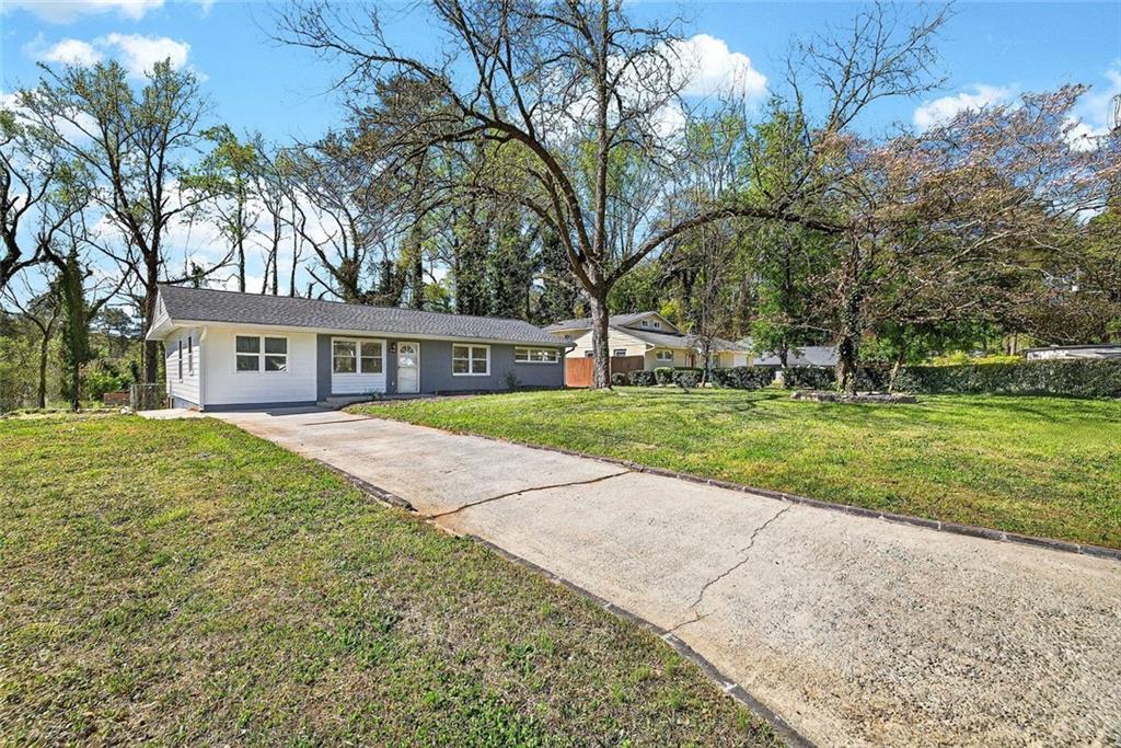 3045 Lindon Lane Decatur, GA 30033 - Photo 3 of 18 a house with garden in front of it