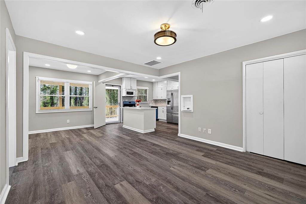 3045 Lindon Lane Decatur, GA 30033 - Photo 5 of 18 a view of a livingroom with wooden floor and windows