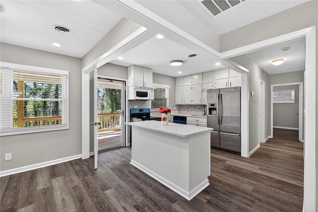 3045 Lindon Lane Decatur, GA 30033 - Photo 8 of 18 a kitchen with refrigerator and cabinets