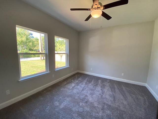 519 Friendship Road Mary Esther, FL 32569 - Photo 39 of 47 a view of an empty room with a window