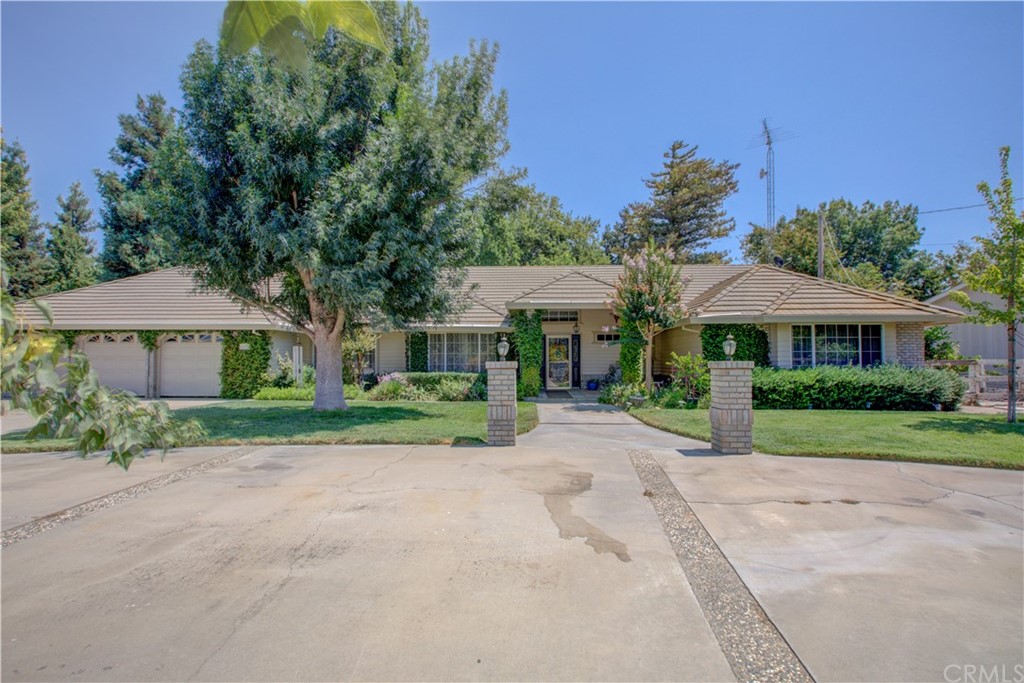 6024 Vivian Road Modesto, CA 95358 - Photo 1 of 1 front view of a house with a yard