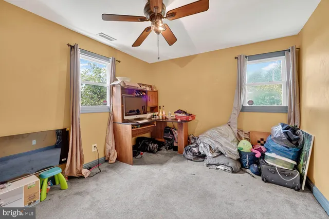 a room with furniture and a window