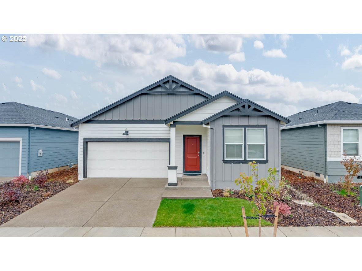 2897 U Street Springfield, OR 97477 - Photo 1 of 26 a front view of a house with garden