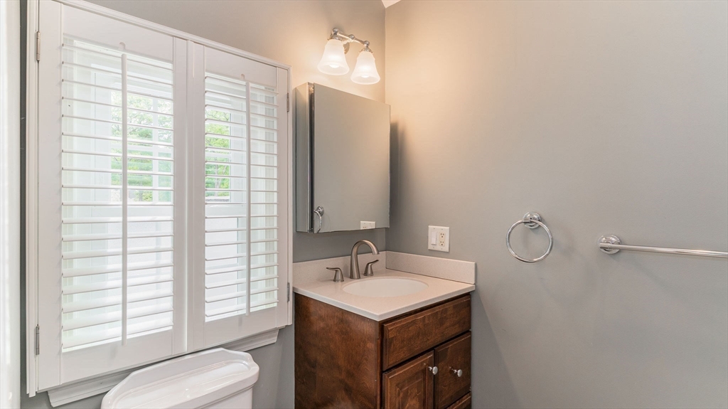 142 Baker Street Walpole, MA 02081 - Photo 31 of 42 a bathroom with a sink vanity granite and toilet