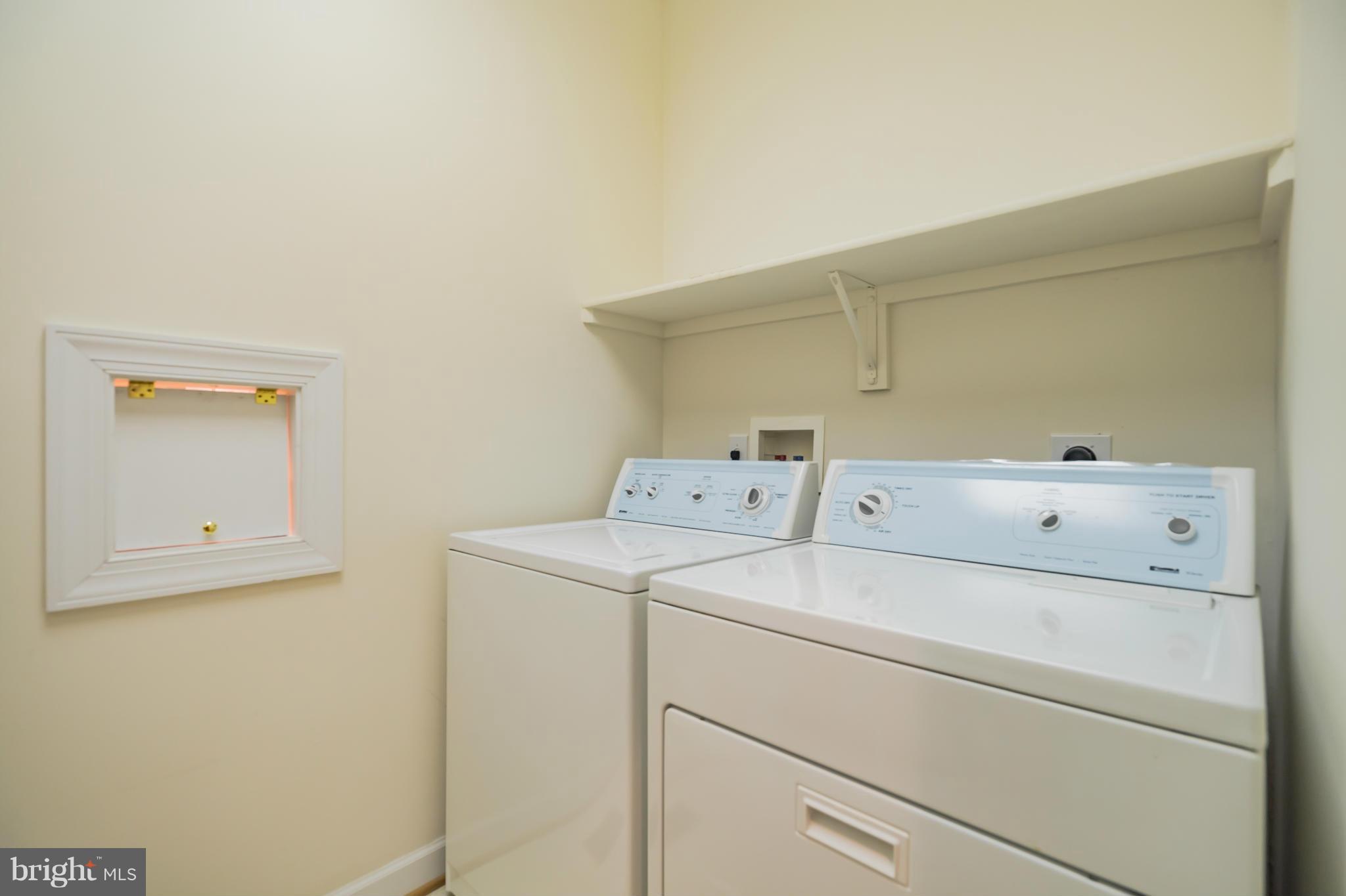 9504 Emory Grove Road Gaithersburg, MD 20877 - Photo 19 of 30 a utility room with dryer and washer