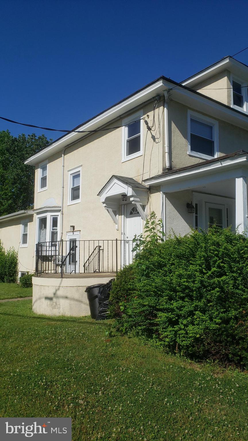 2931 Nottingham Way Hamilton, NJ 08619 - Photo 11 of 19 a front view of a house with a yard