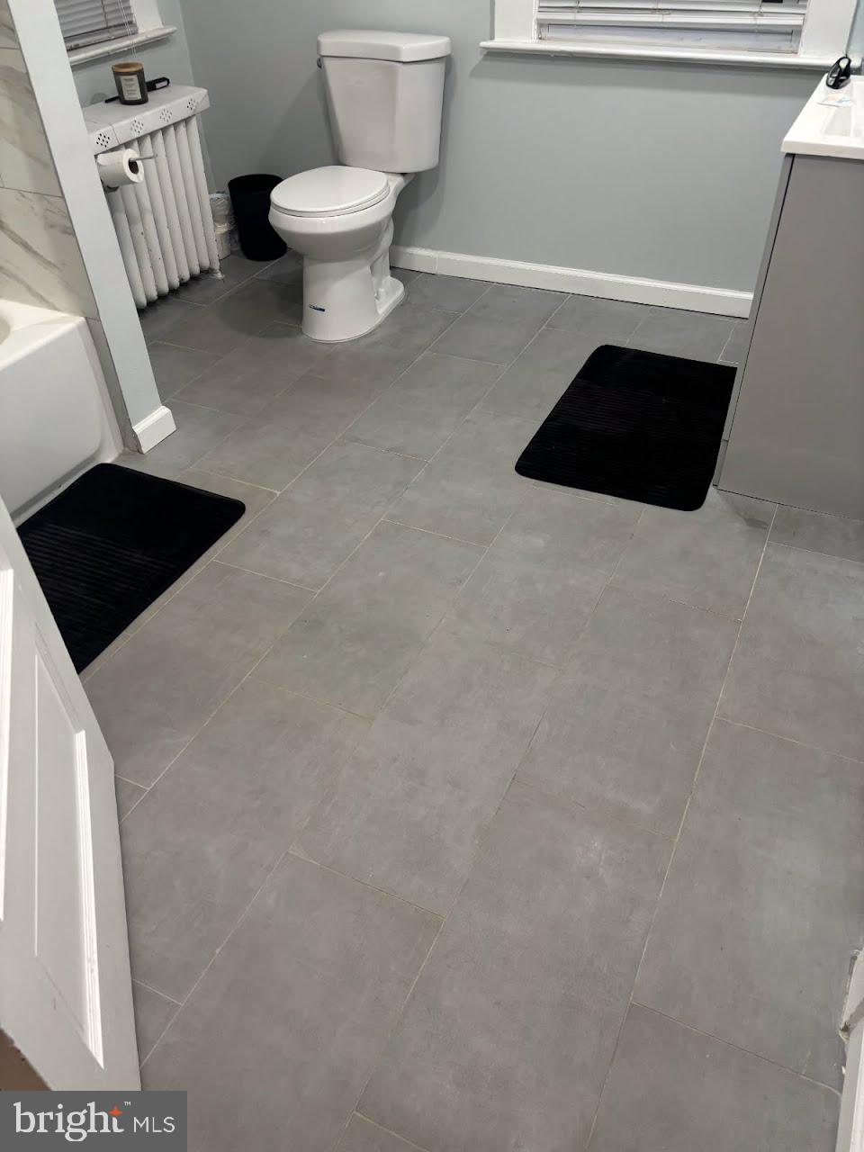 2931 Nottingham Way Hamilton, NJ 08619 - Photo 14 of 19 a bathroom with a toilet and a shower