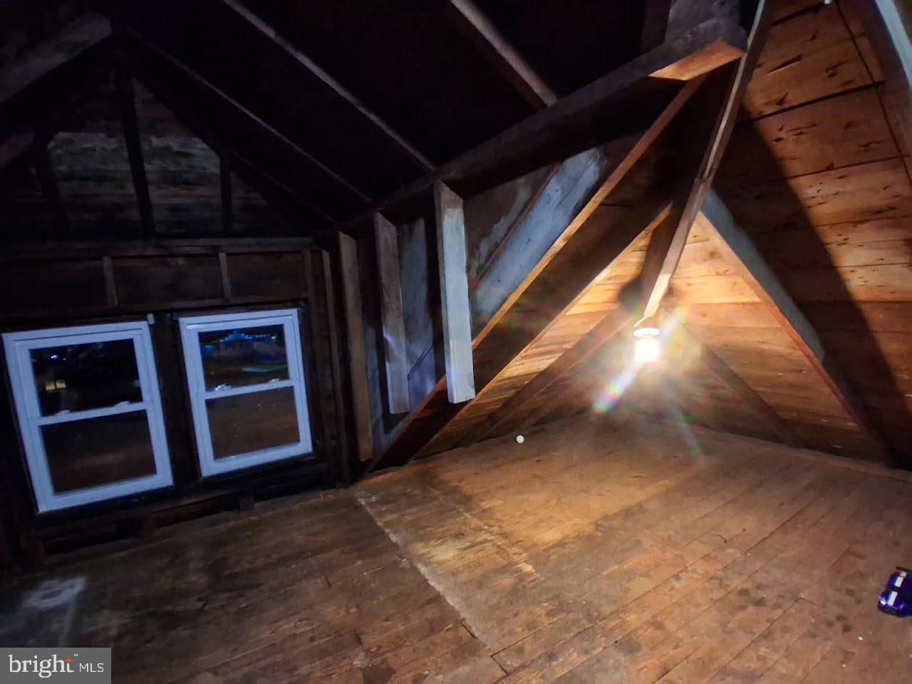 2931 Nottingham Way Hamilton, NJ 08619 - Photo 19 of 19 a view of an empty room with wooden floor and windows
