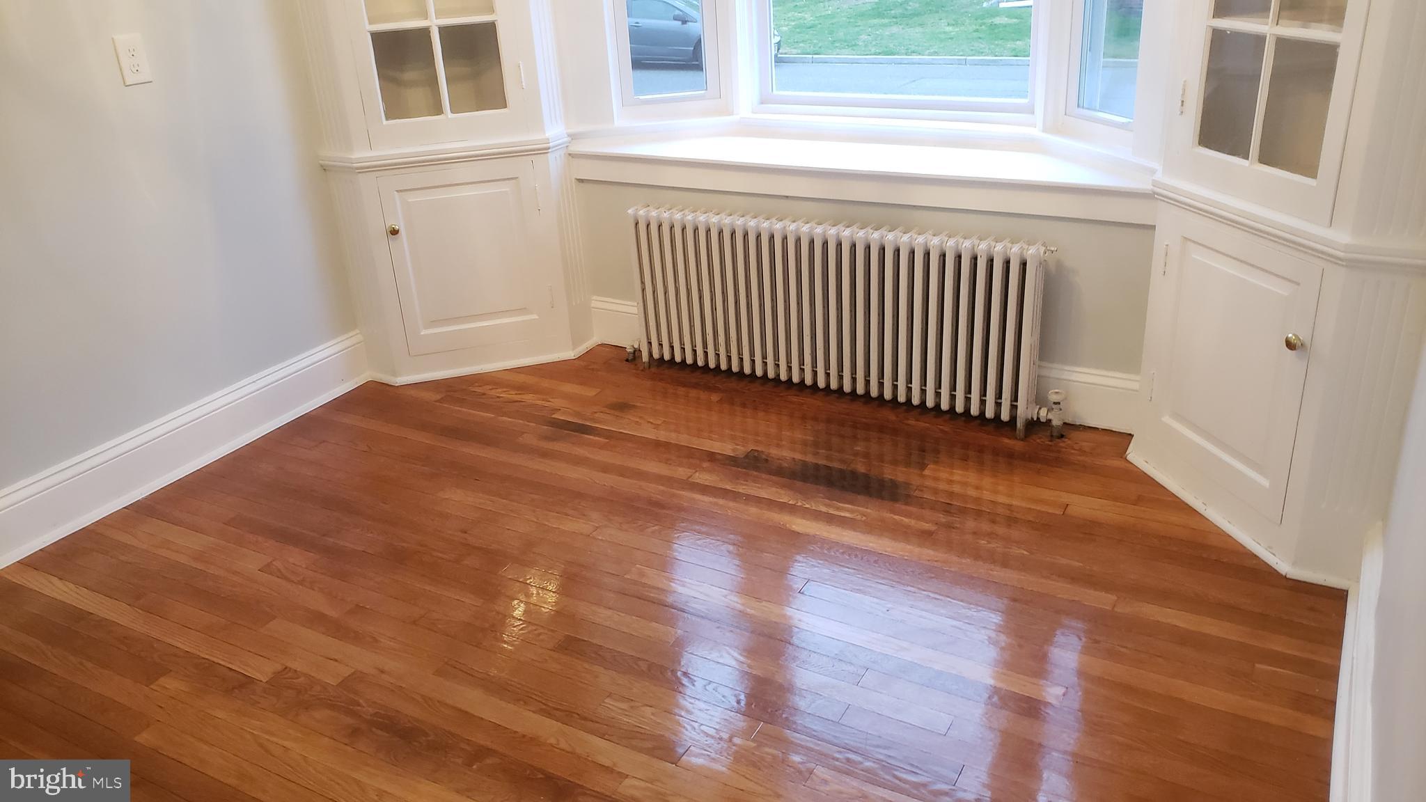 2931 Nottingham Way Hamilton, NJ 08619 - Photo 5 of 19 a view of empty room with wooden floor and fan