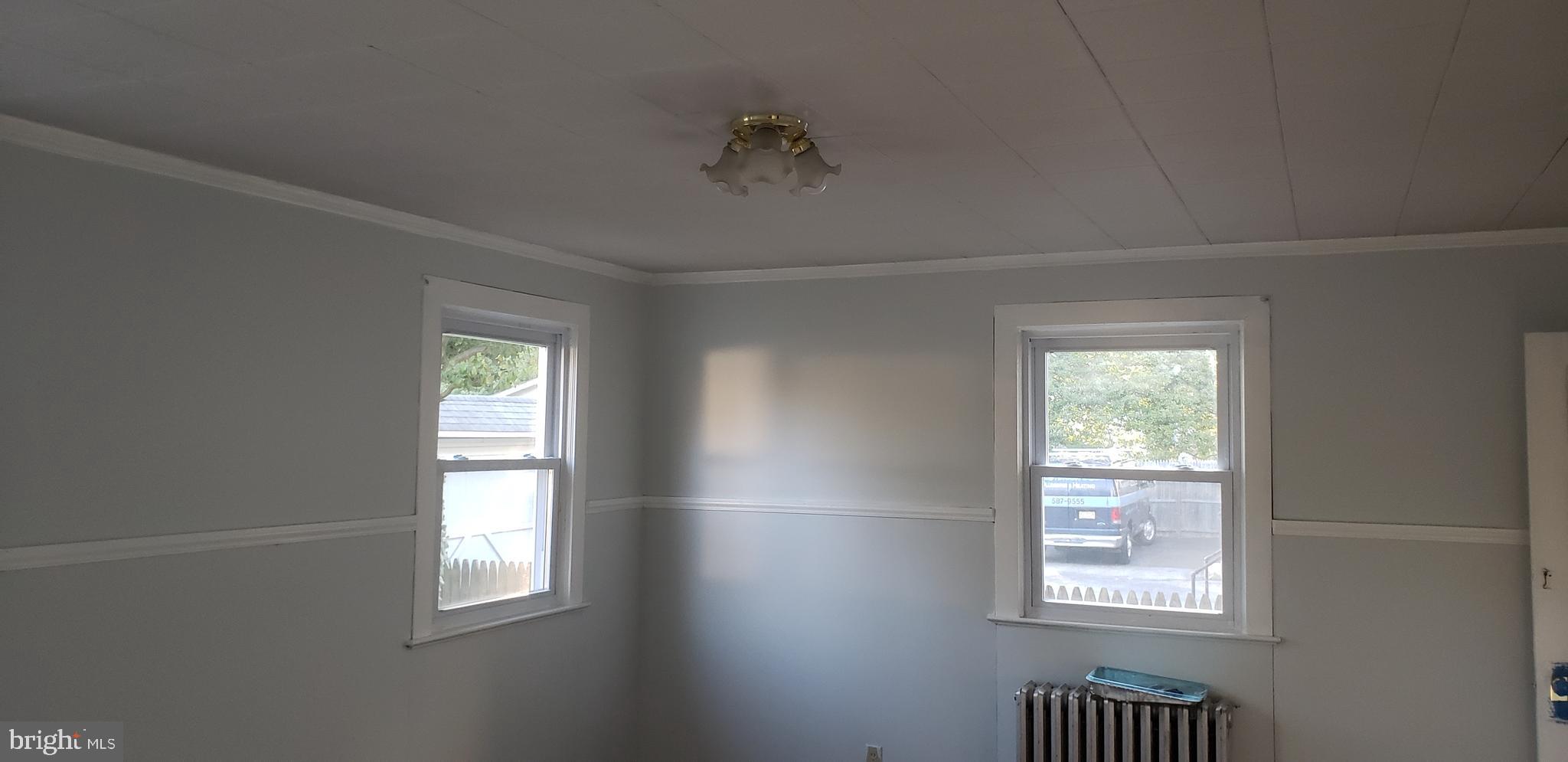 2931 Nottingham Way Hamilton, NJ 08619 - Photo 8 of 19 an empty room with windows