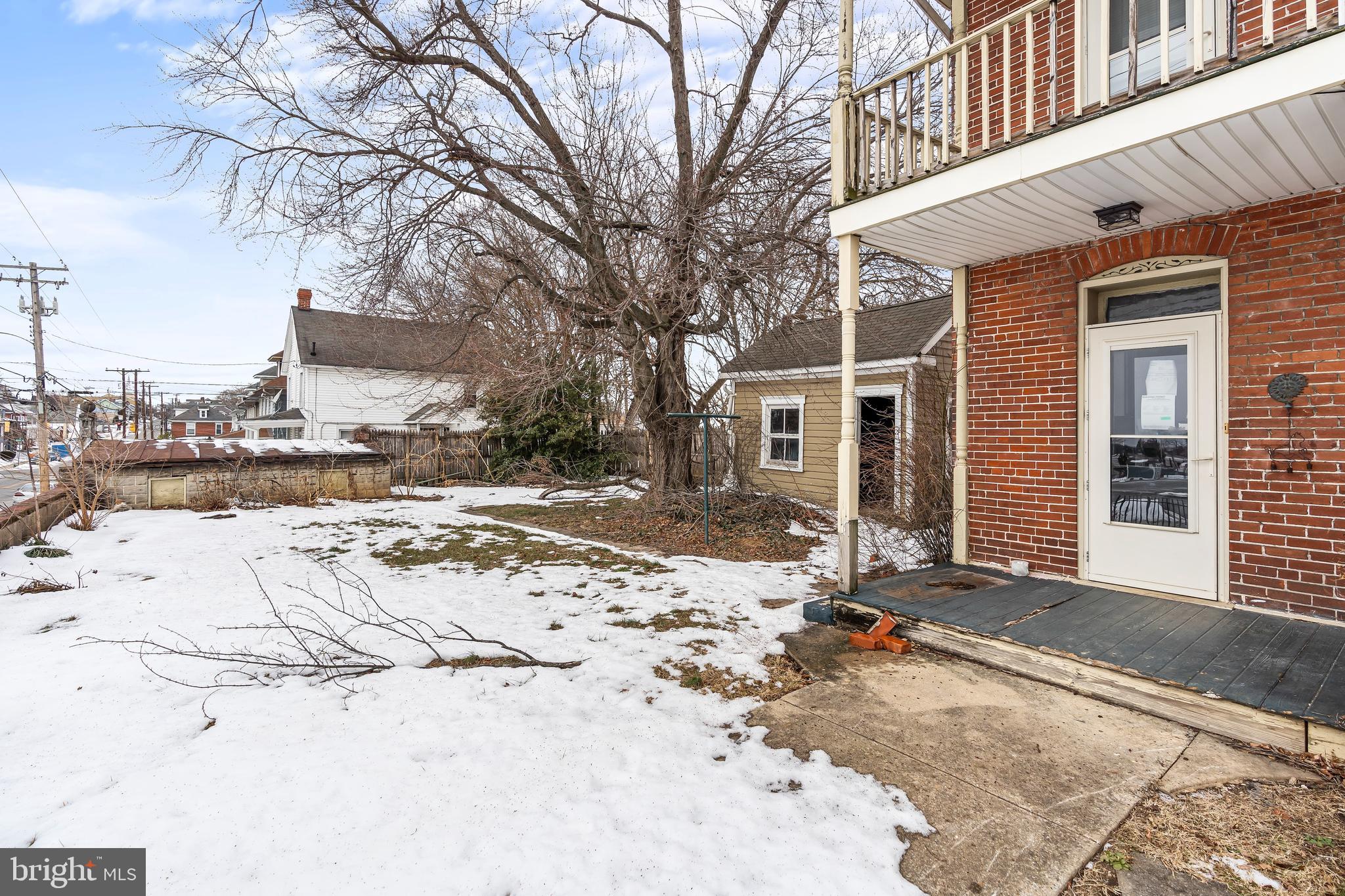 767 Spruce Street Hagerstown, MD 21740 - Photo 21 of 36 a view of a house with snow on the road
