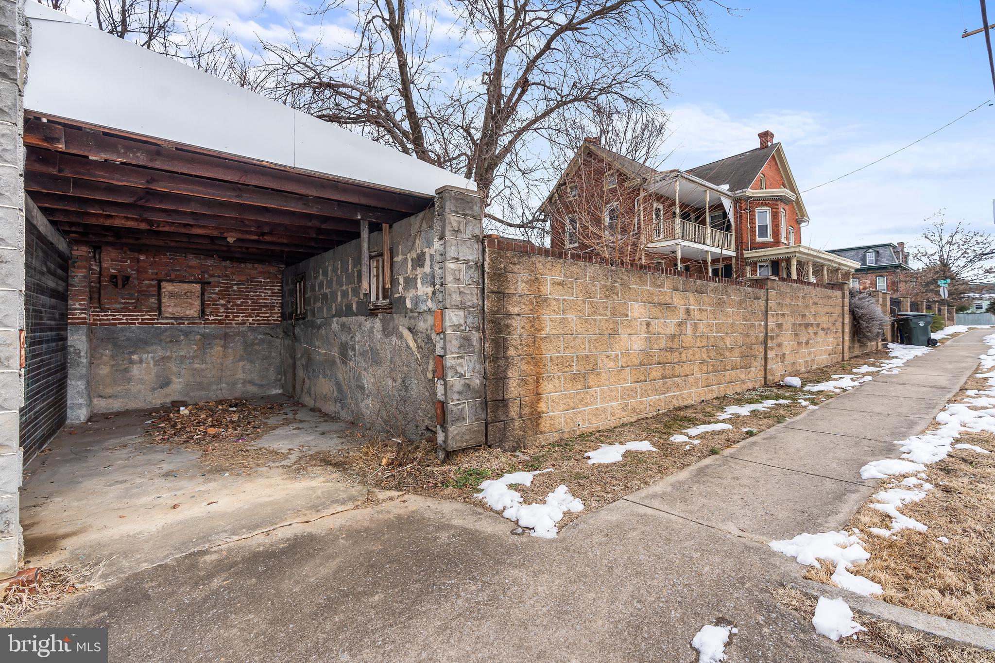 767 Spruce Street Hagerstown, MD 21740 - Photo 23 of 36 a front view of a house with a yard