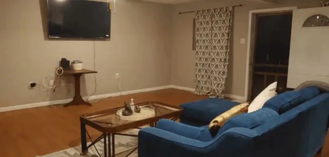 a view of a livingroom with furniture