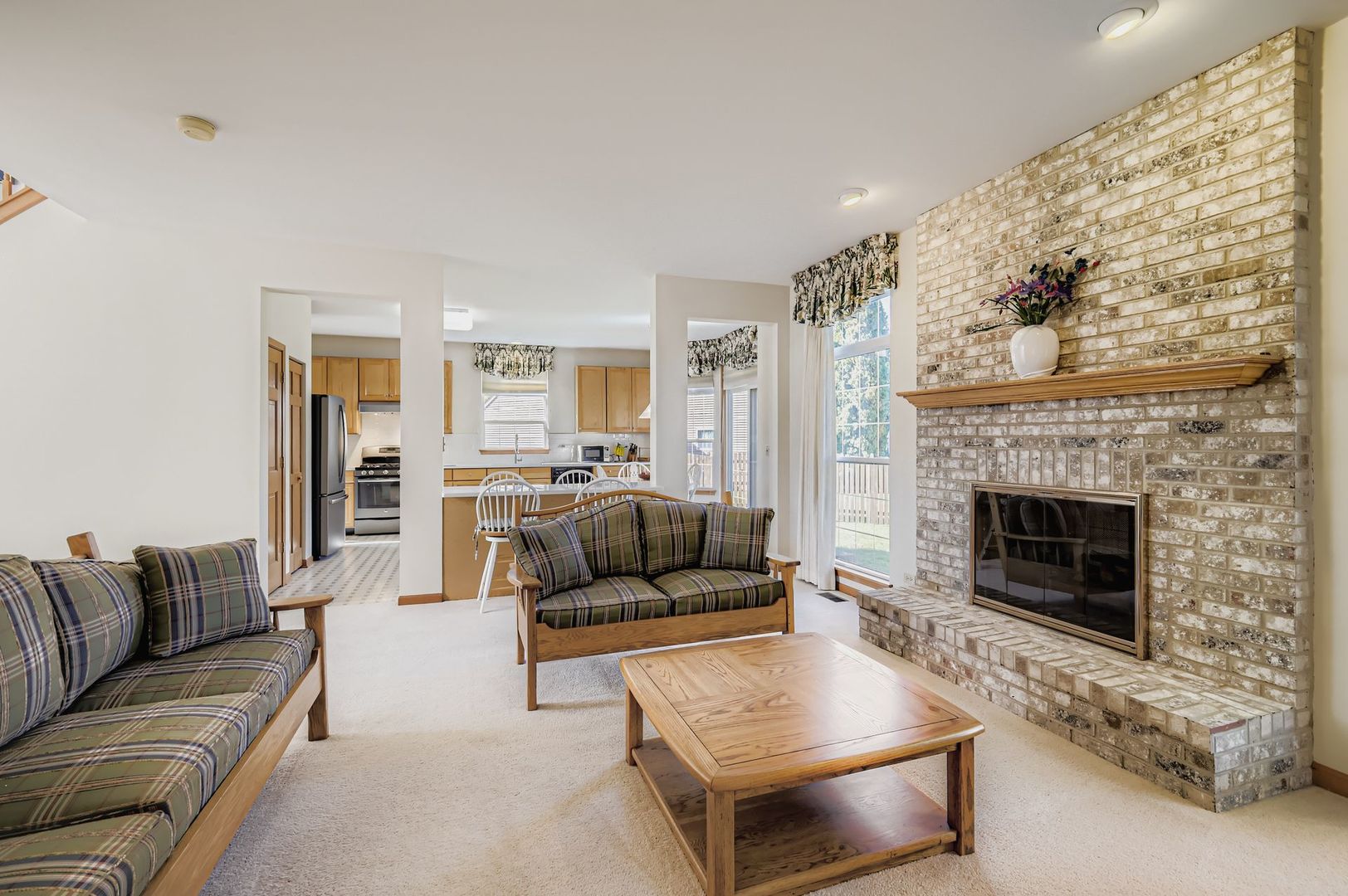 1920 Butler Drive Bartlett, IL 60103 - Photo 14 of 27 a living room with furniture and a fireplace