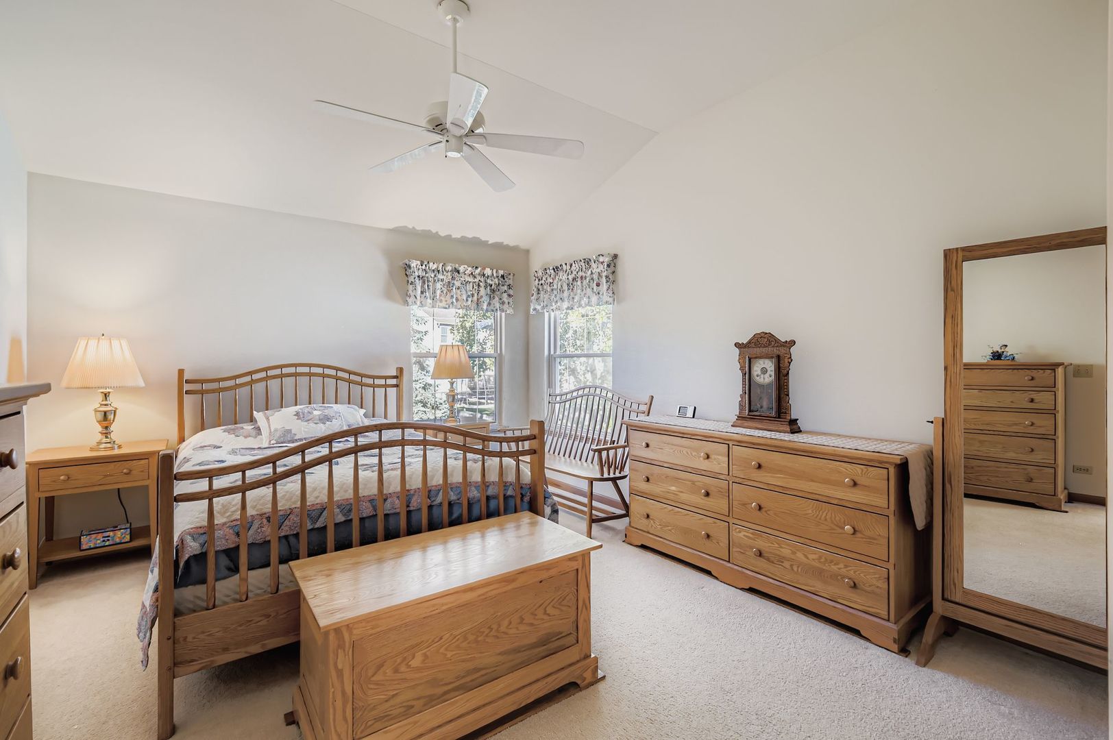1920 Butler Drive Bartlett, IL 60103 - Photo 16 of 27 a bedroom with a bed and a chandelier