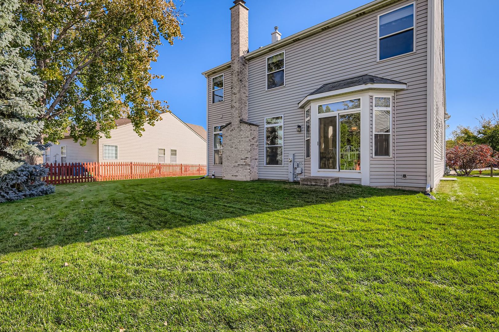 1920 Butler Drive Bartlett, IL 60103 - Photo 27 of 27 a view of a house with backyard and garden