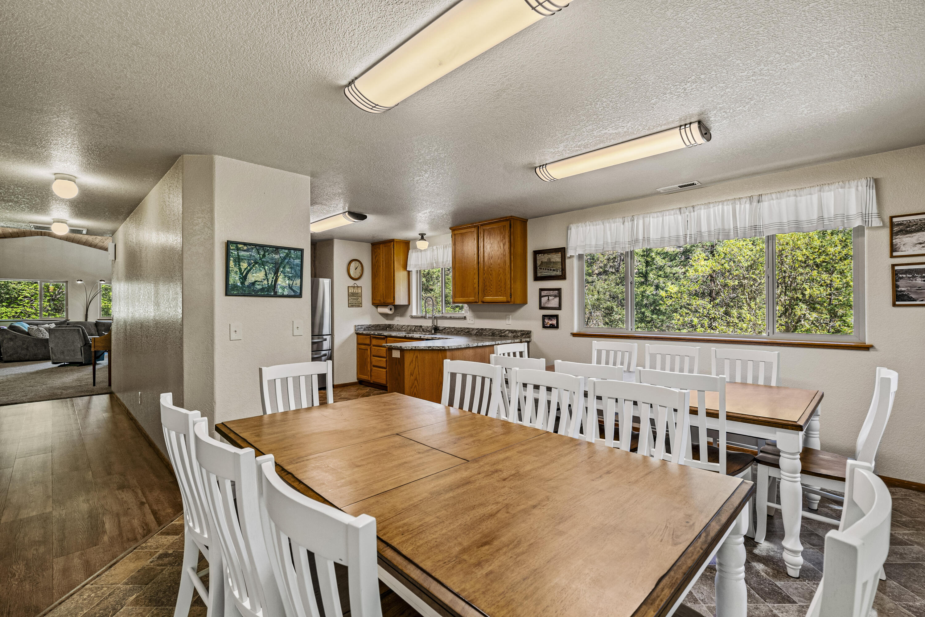 11744 Galice Road Merlin, OR 97532 - Photo 22 of 74 a view of a dining room with furniture window and wooden floor
