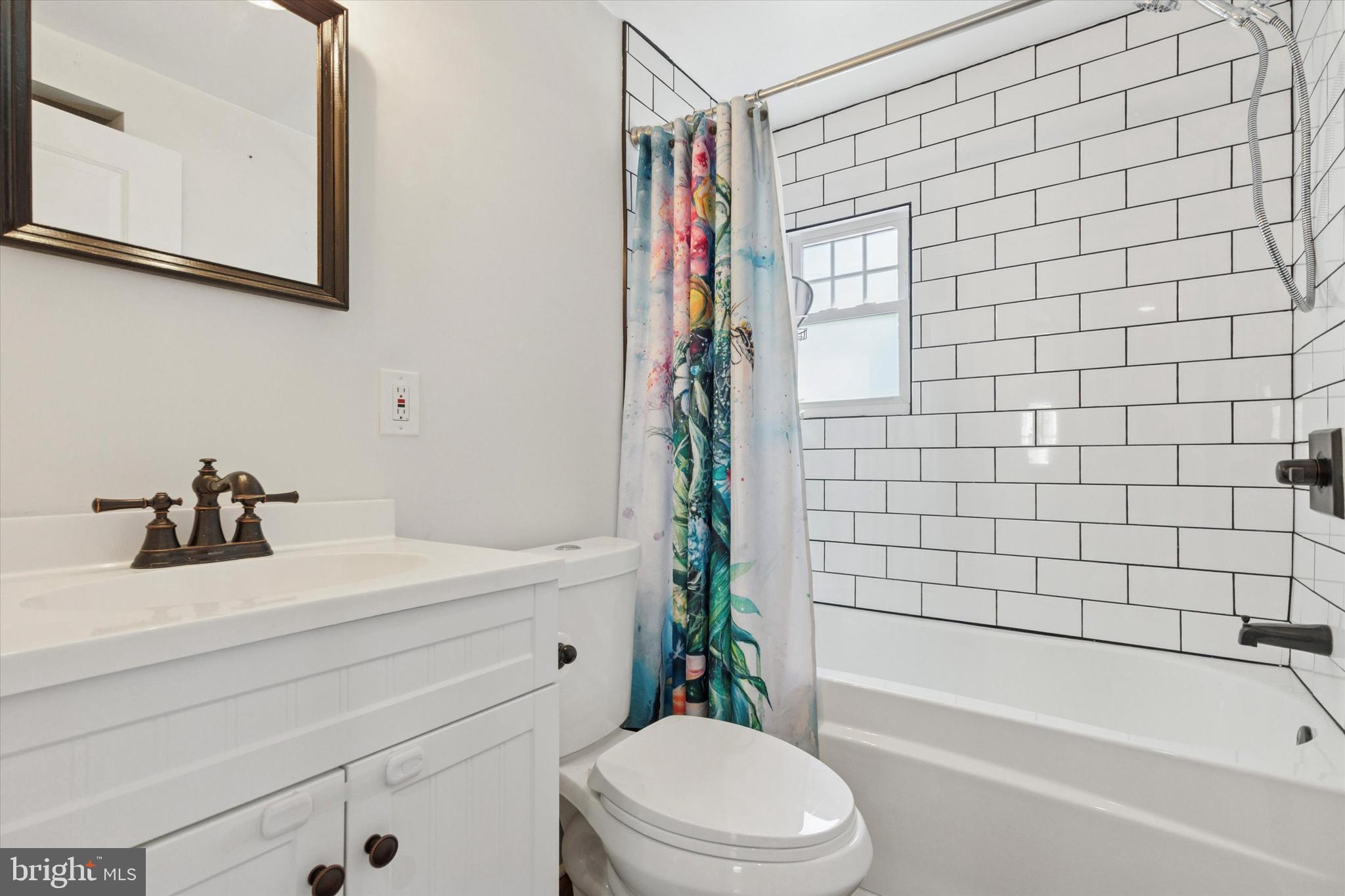 404 Exton Road Hatboro, PA 19040 - Photo 11 of 25 a bathroom with a sink a toilet and shower