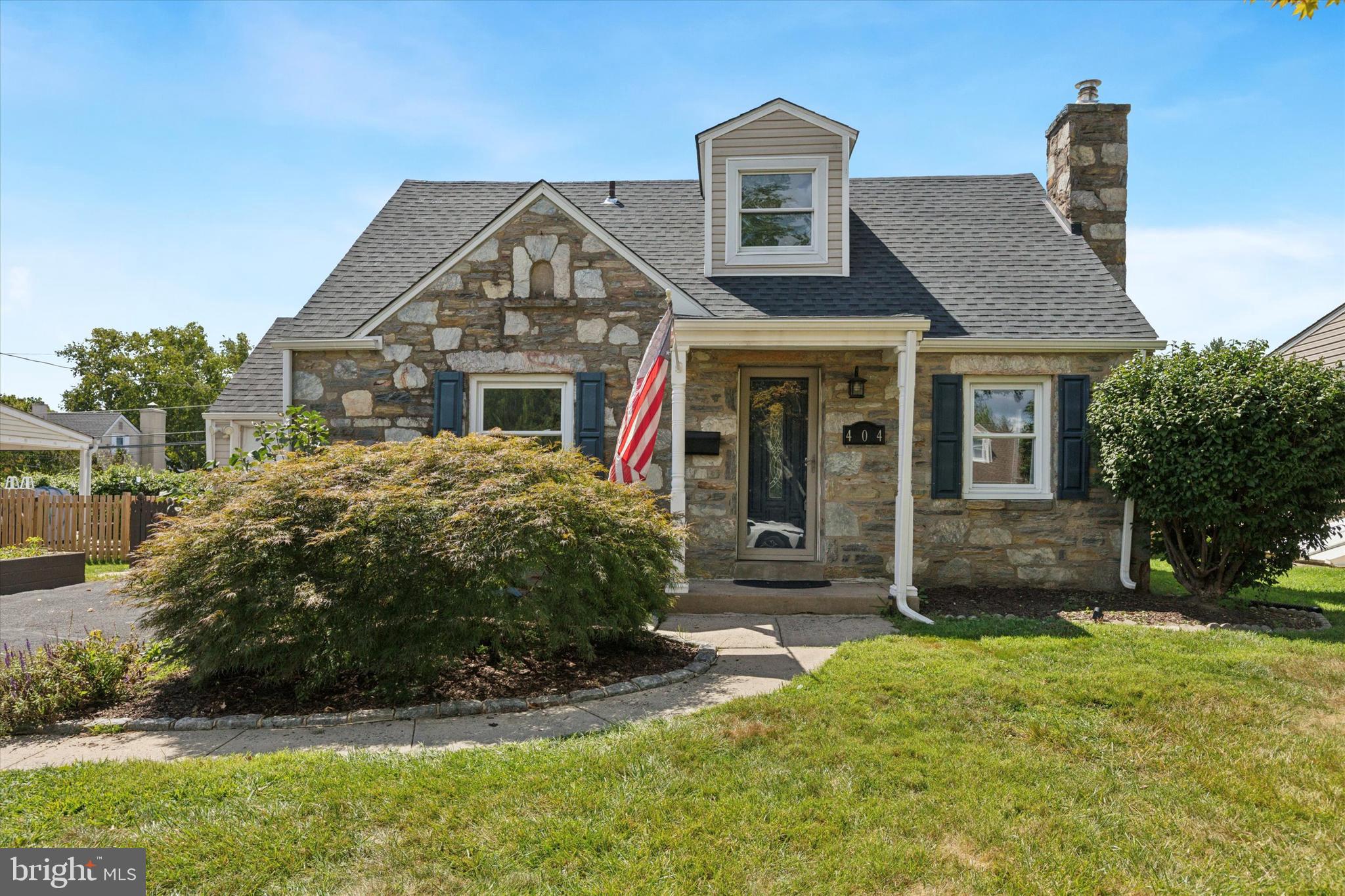 404 Exton Road Hatboro, PA 19040 - Photo 2 of 25 a front view of a house with a yard