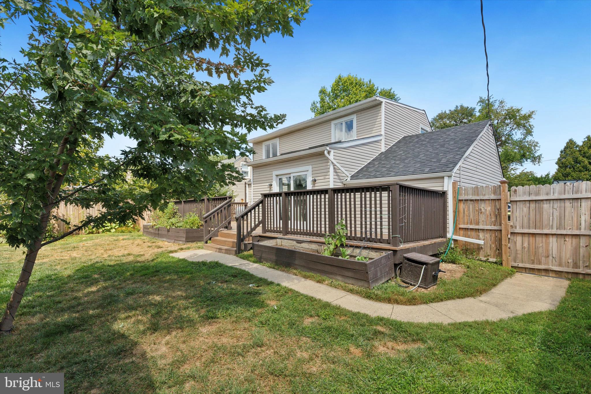 404 Exton Road Hatboro, PA 19040 - Photo 23 of 25 a view of a house with backyard and sitting area