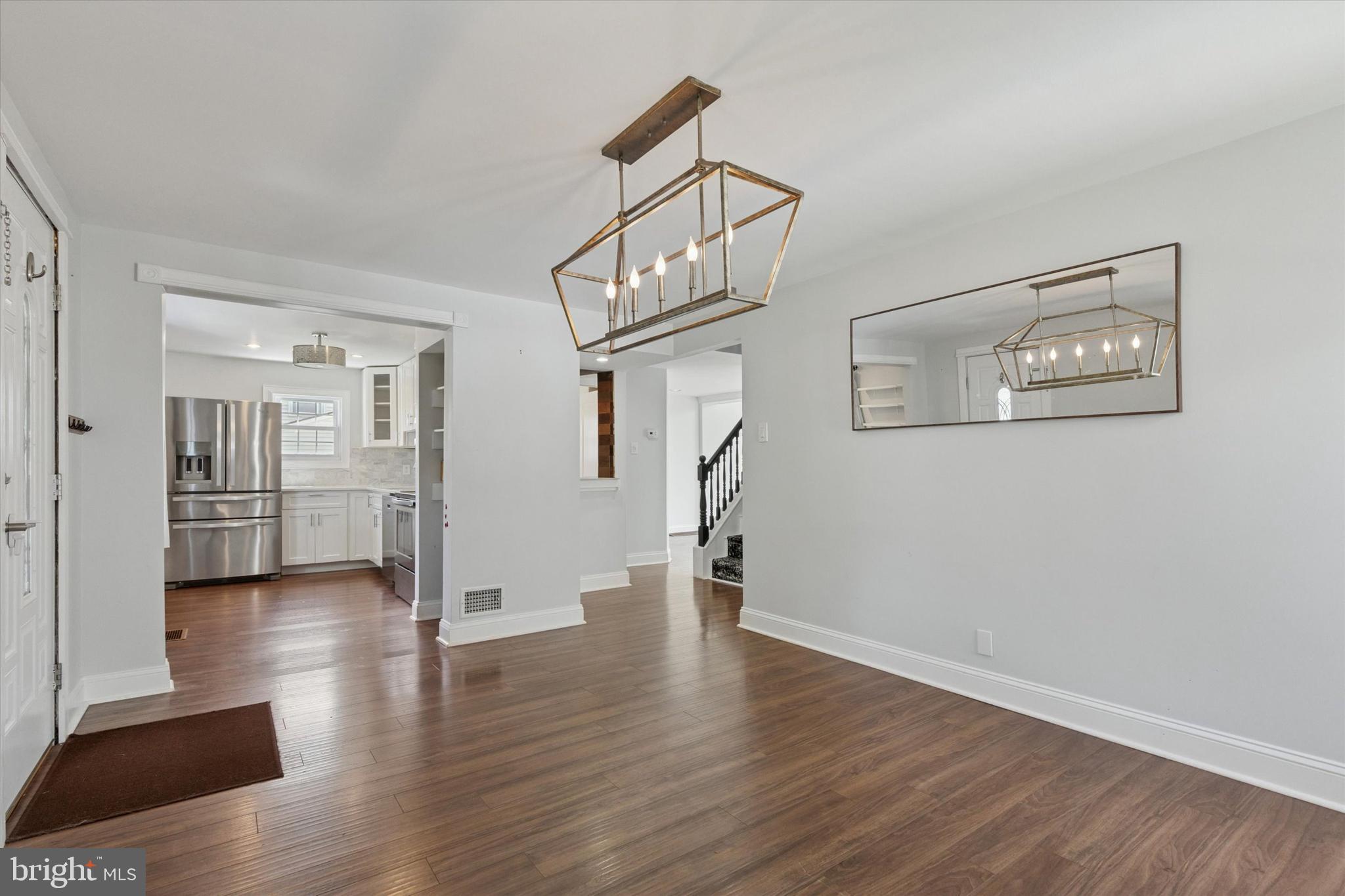 404 Exton Road Hatboro, PA 19040 - Photo 3 of 25 a view of an entryway with wooden floor