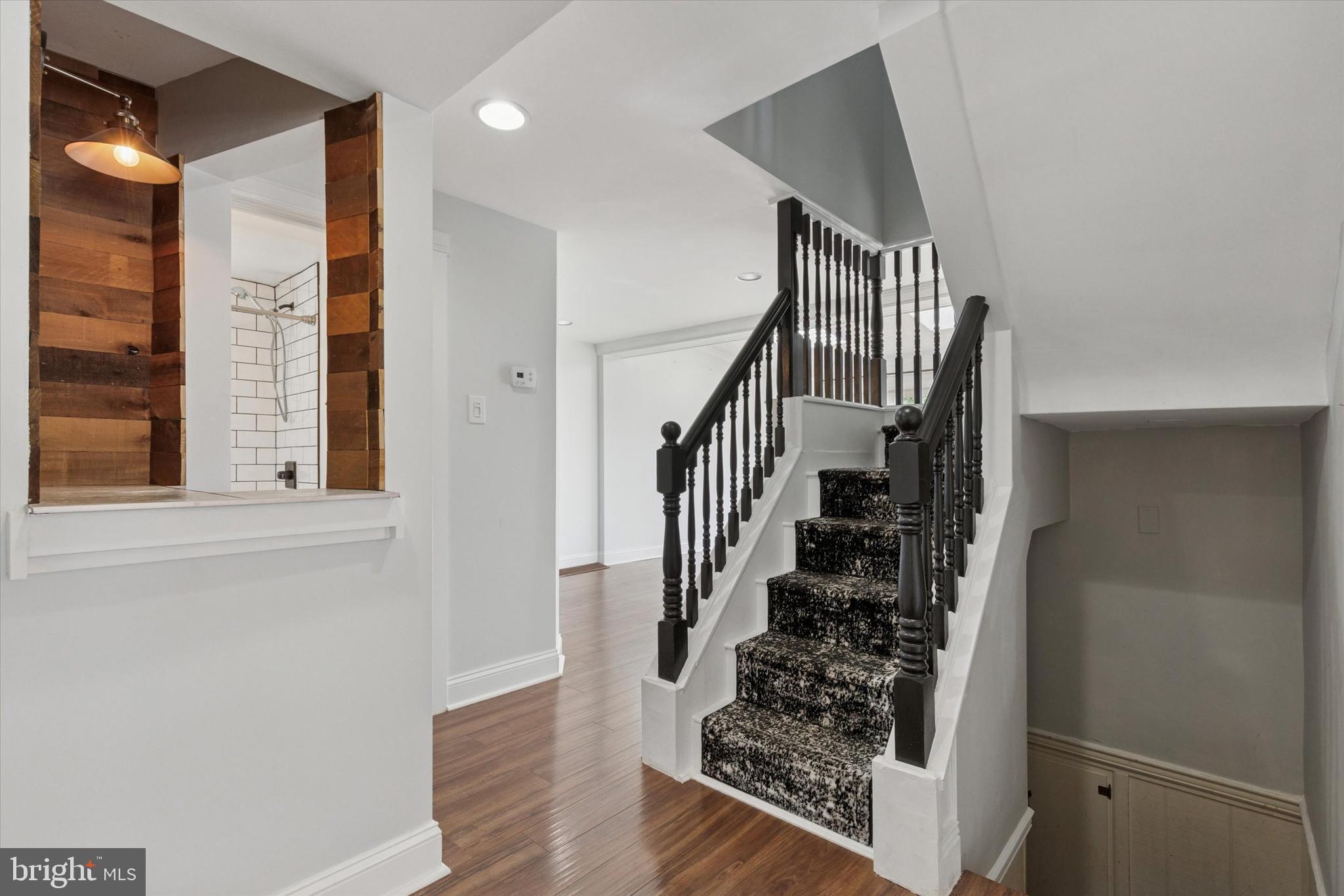 404 Exton Road Hatboro, PA 19040 - Photo 6 of 25 a view of entryway and hall with wooden floor