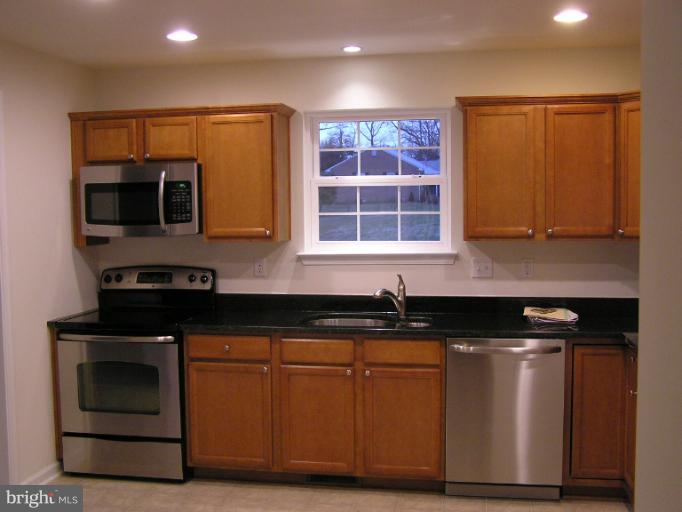 9134 Philadelphia Road Rosedale, MD 21237 - Photo 8 of 24 Lots of recessed lighting in the kitchen