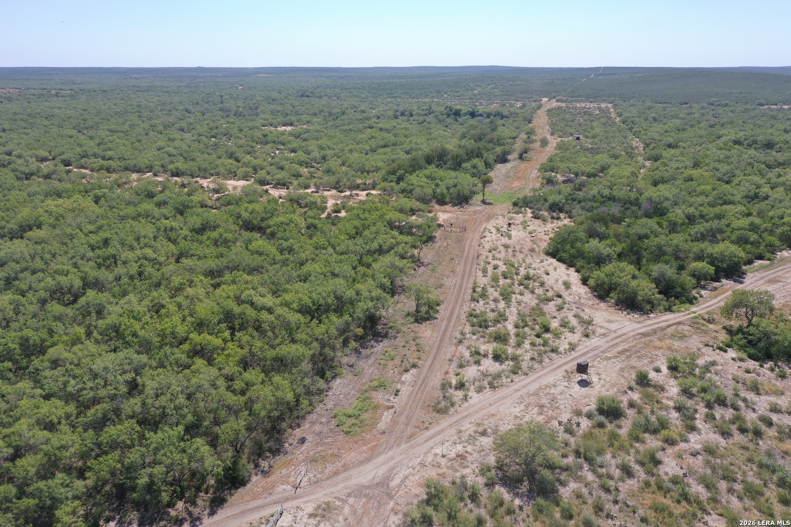 0 Fm 140 Pearsall, TX 78061 - Photo 12 of 28 an aerial view of residential houses with outdoor space