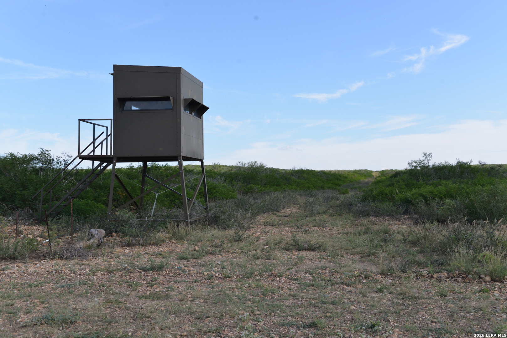 0 Fm 140 Pearsall, TX 78061 - Photo 15 of 28 a view of a bench in middle of the green field