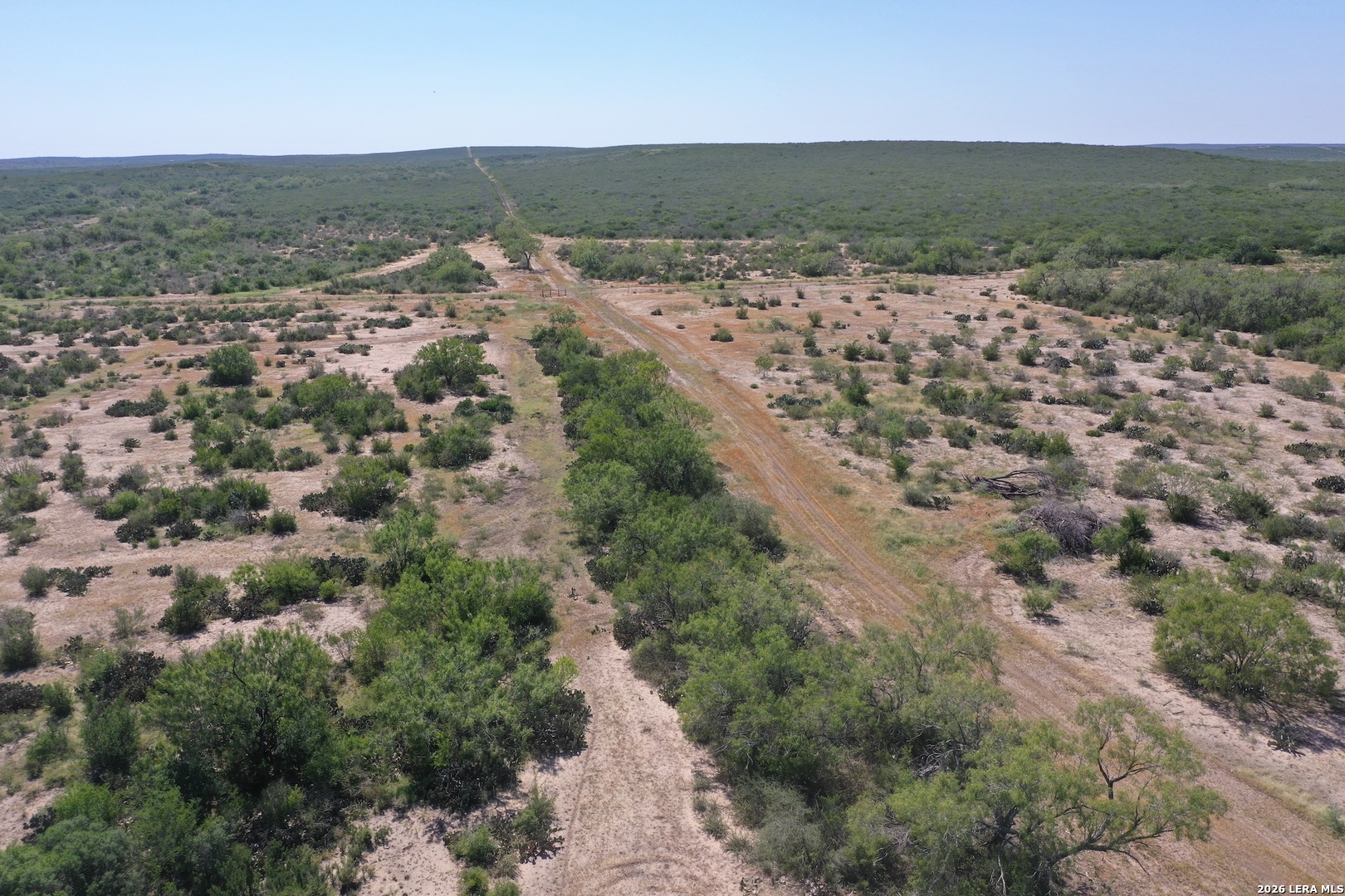 0 Fm 140 Pearsall, TX 78061 - Photo 9 of 28 an aerial view of residential houses with outdoor space