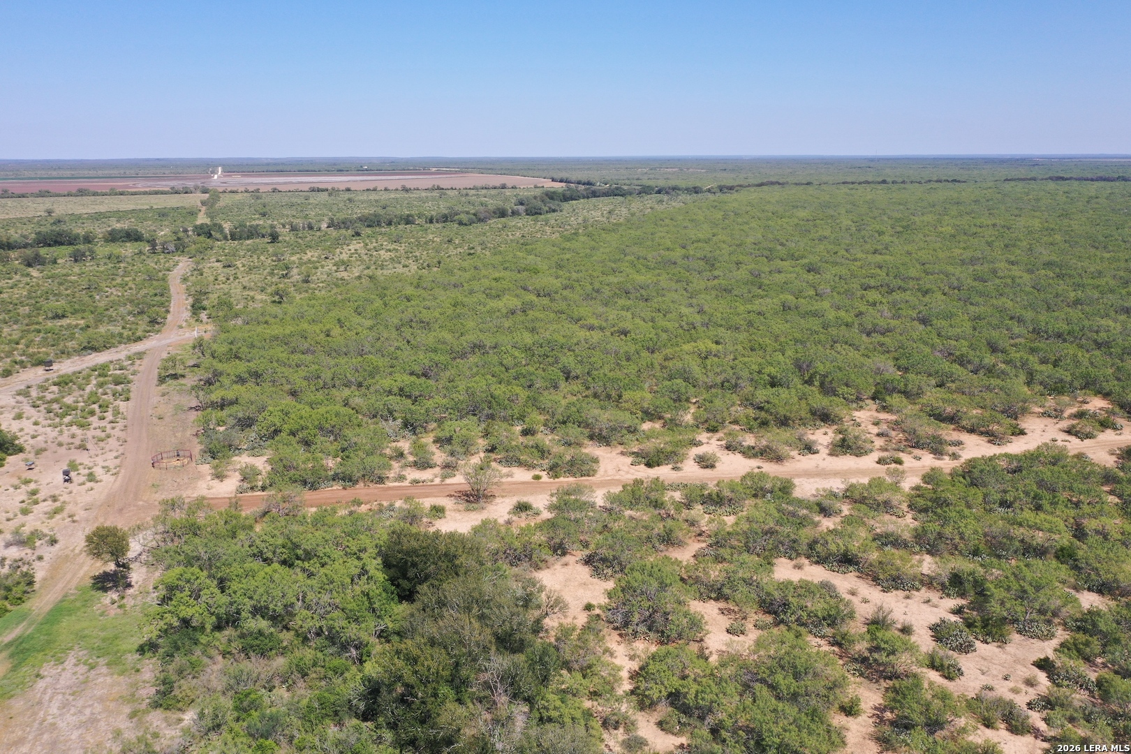 0 Fm 140 Pearsall, TX 78061 - Photo 10 of 28 a view of a lake with a mountain in the background