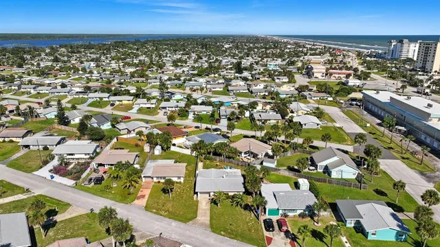an aerial view of a city with lots of residential buildings