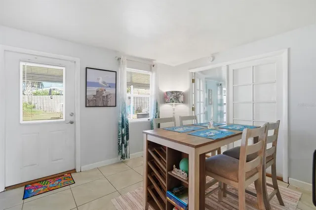 a kitchen that has a cabinets and a table in it