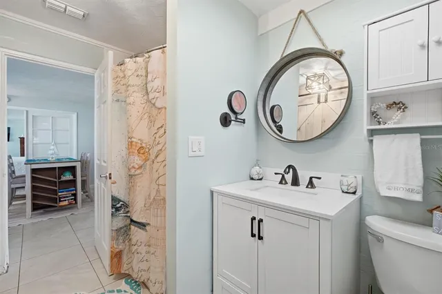 a bathroom with a toilet and a sink