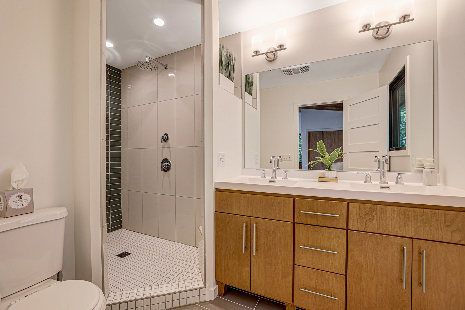 35W424 Miller Road Dundee, IL 60102 - Photo 20 of 33 a bathroom with a shower sink vanity mirror and toilet