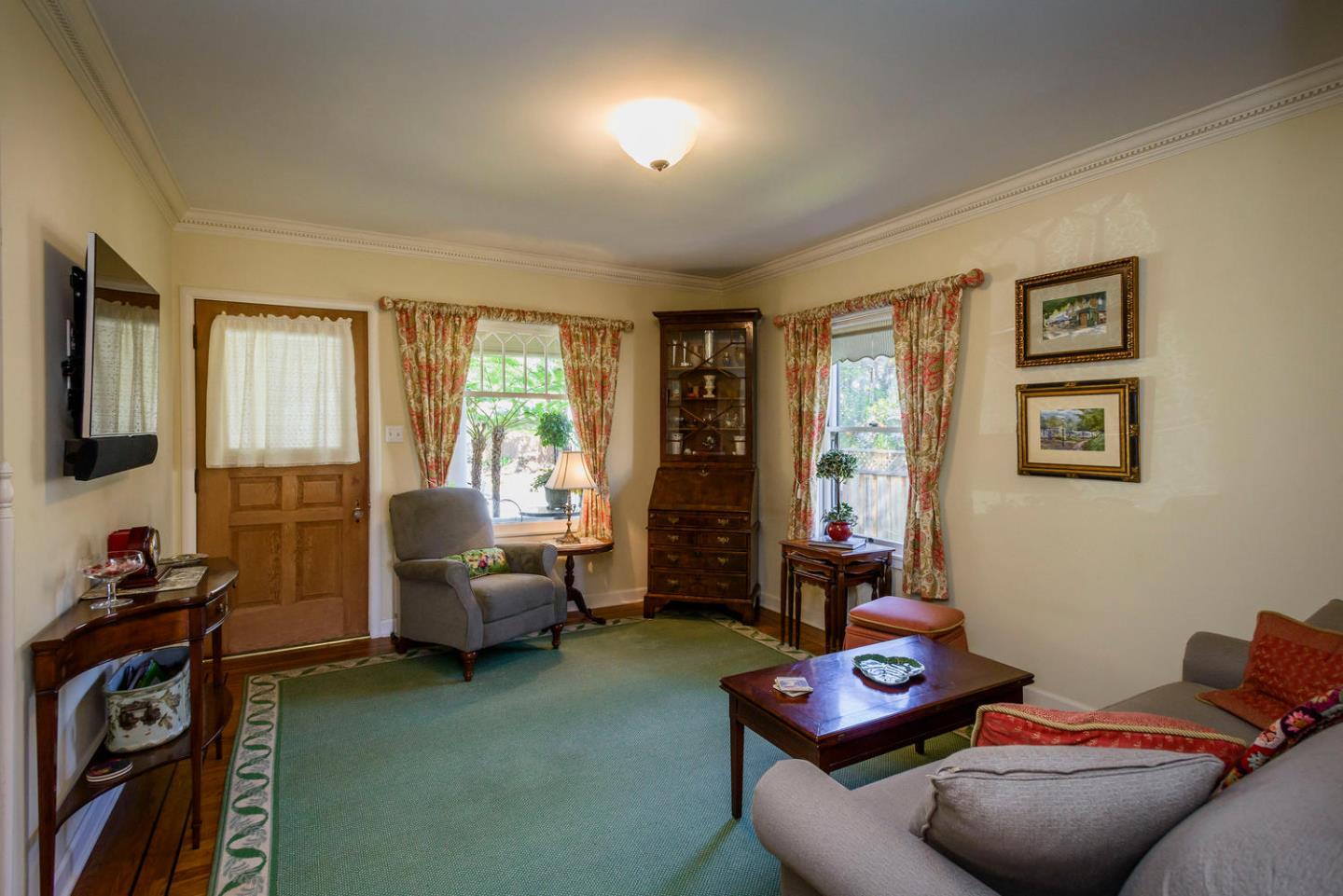 466 Ruthven Avenue Palo Alto, CA 94301 - Photo 2 of 12 a living room with furniture and a window