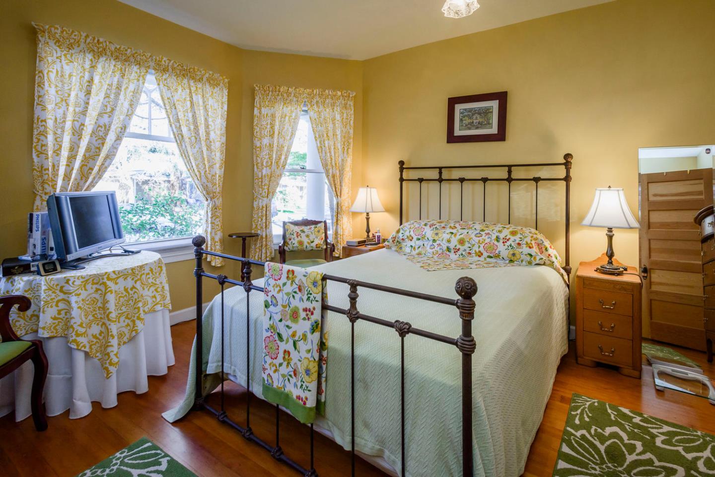 466 Ruthven Avenue Palo Alto, CA 94301 - Photo 6 of 12 a bedroom with furniture and a window