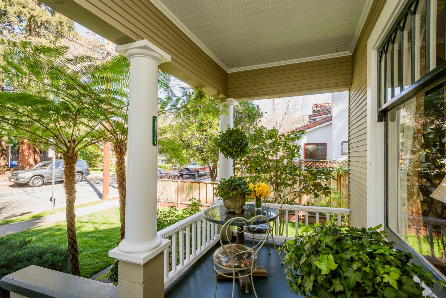 466 Ruthven Avenue Palo Alto, CA 94301 - Photo 9 of 12 a view of a porch with furniture and a yard