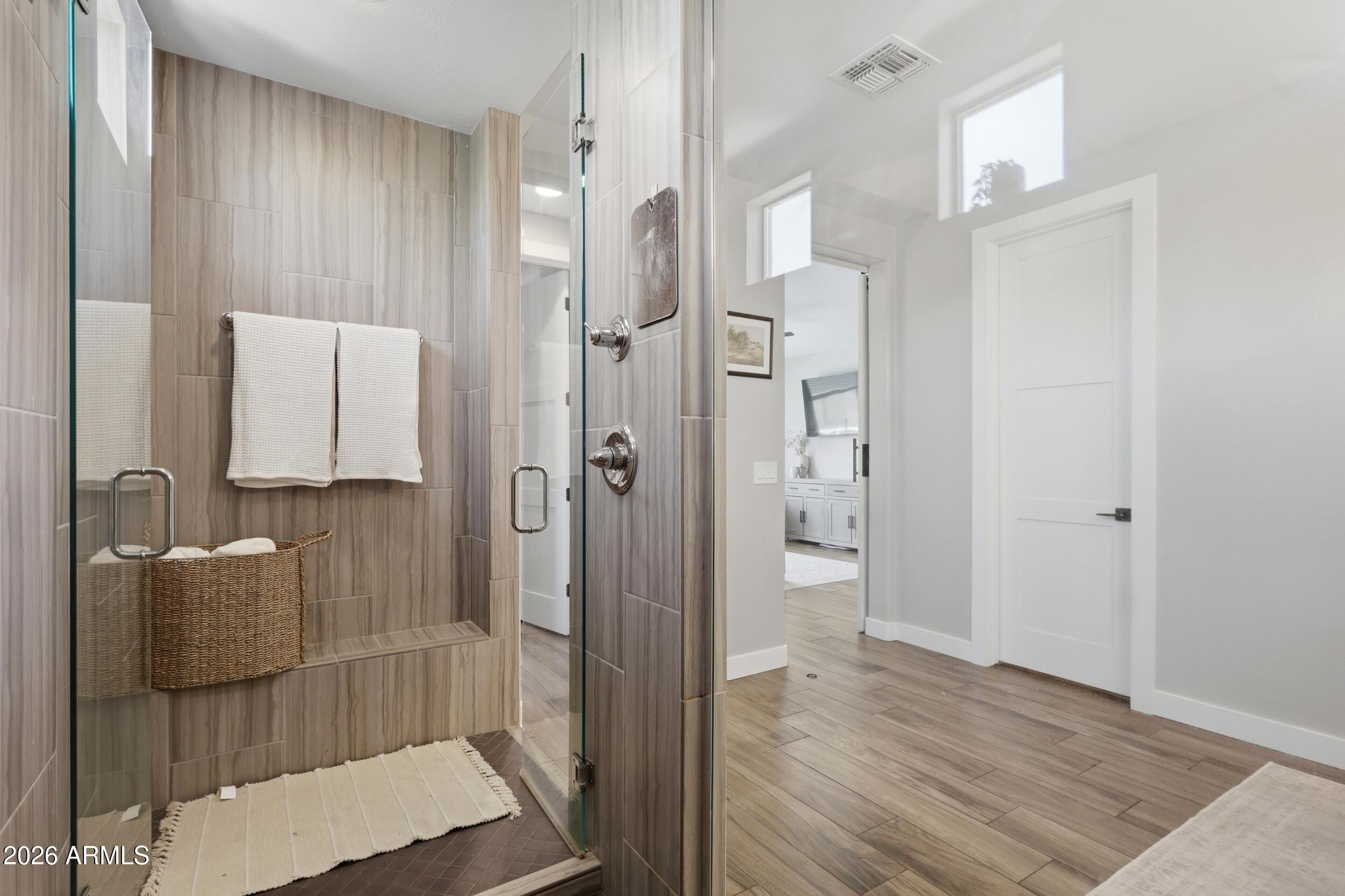 12517 West Lawrence Road Glendale, AZ 85307 - Photo 29 of 52 a bathroom with a shower