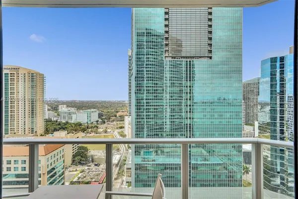 a view of a balcony with city view
