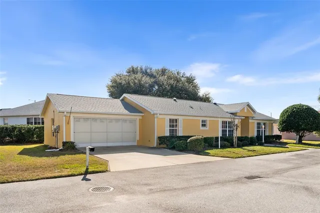 a view of house with outdoor space and street view