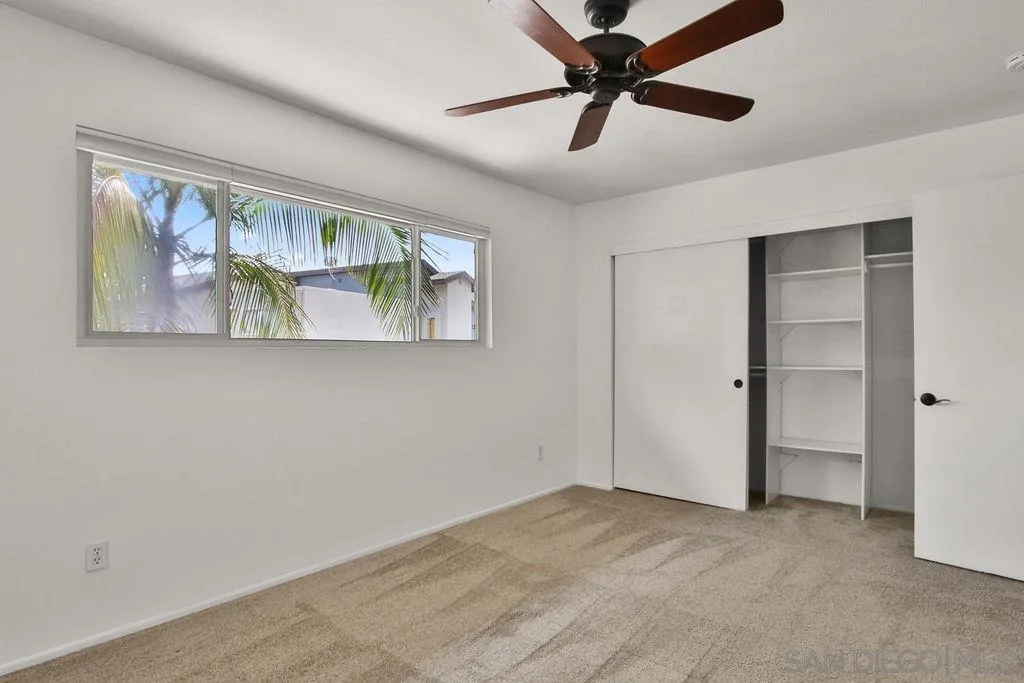 6359 Rancho Mission Road, Unit 7 San Diego, CA 92108 - Photo 19 of 25 a view of an empty room with a window