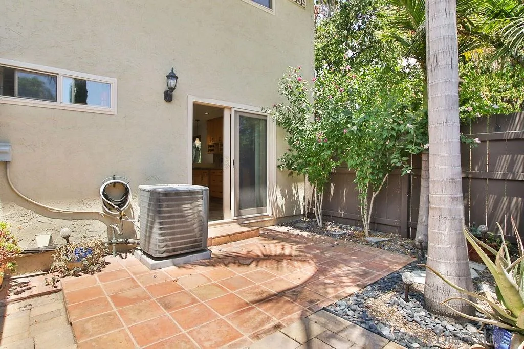 6359 Rancho Mission Road, Unit 7 San Diego, CA 92108 - Photo 10 of 25 a backyard of a house with seating space