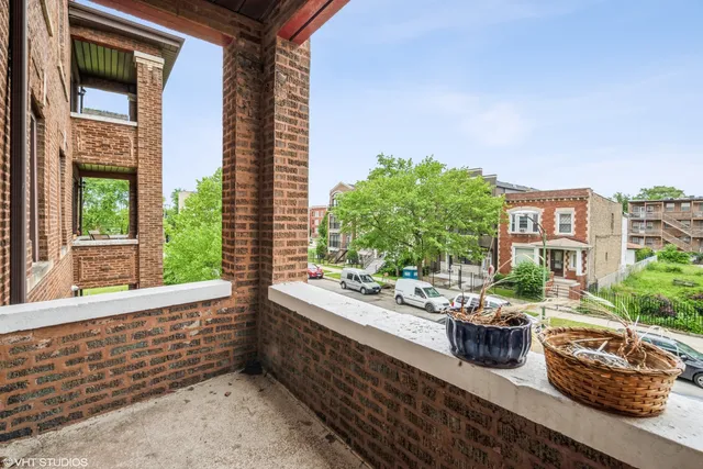 a view of a living room and a balcony