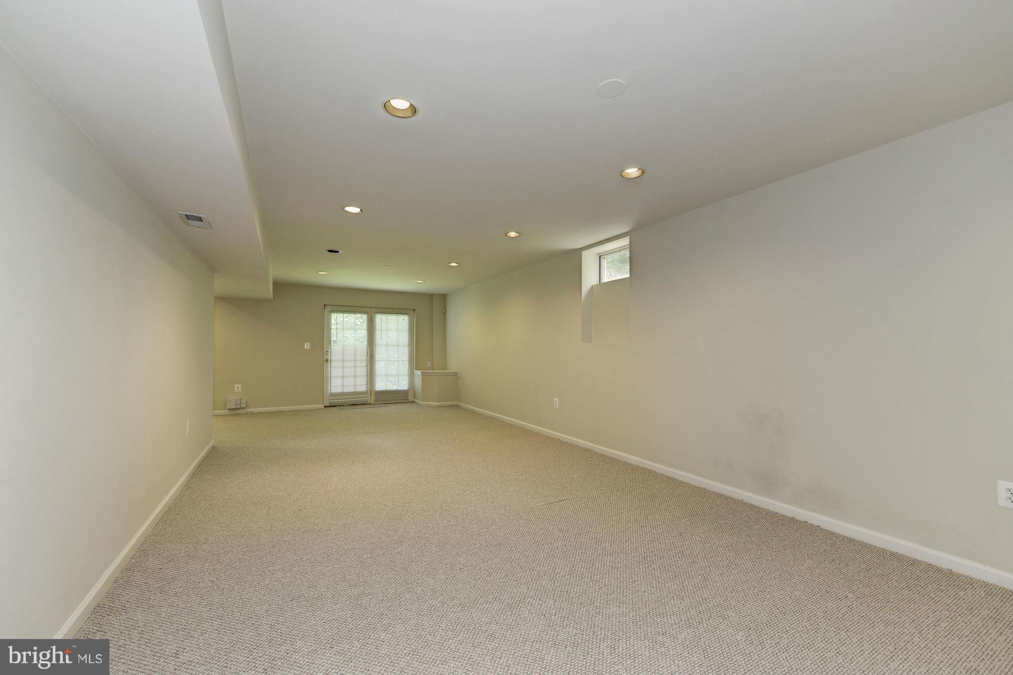 1357 Tunwell Stable Court Reston, VA 20194 - Photo 21 of 27 LL Recreational Room w/walk out glass doors