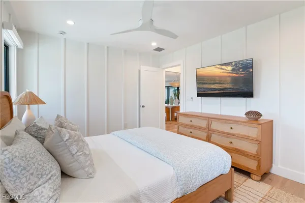 a bathroom with a toilet a sink and shower