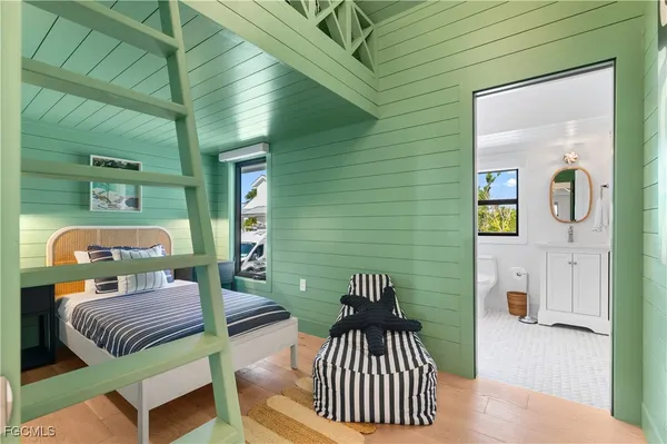 a view of balcony with wooden floor