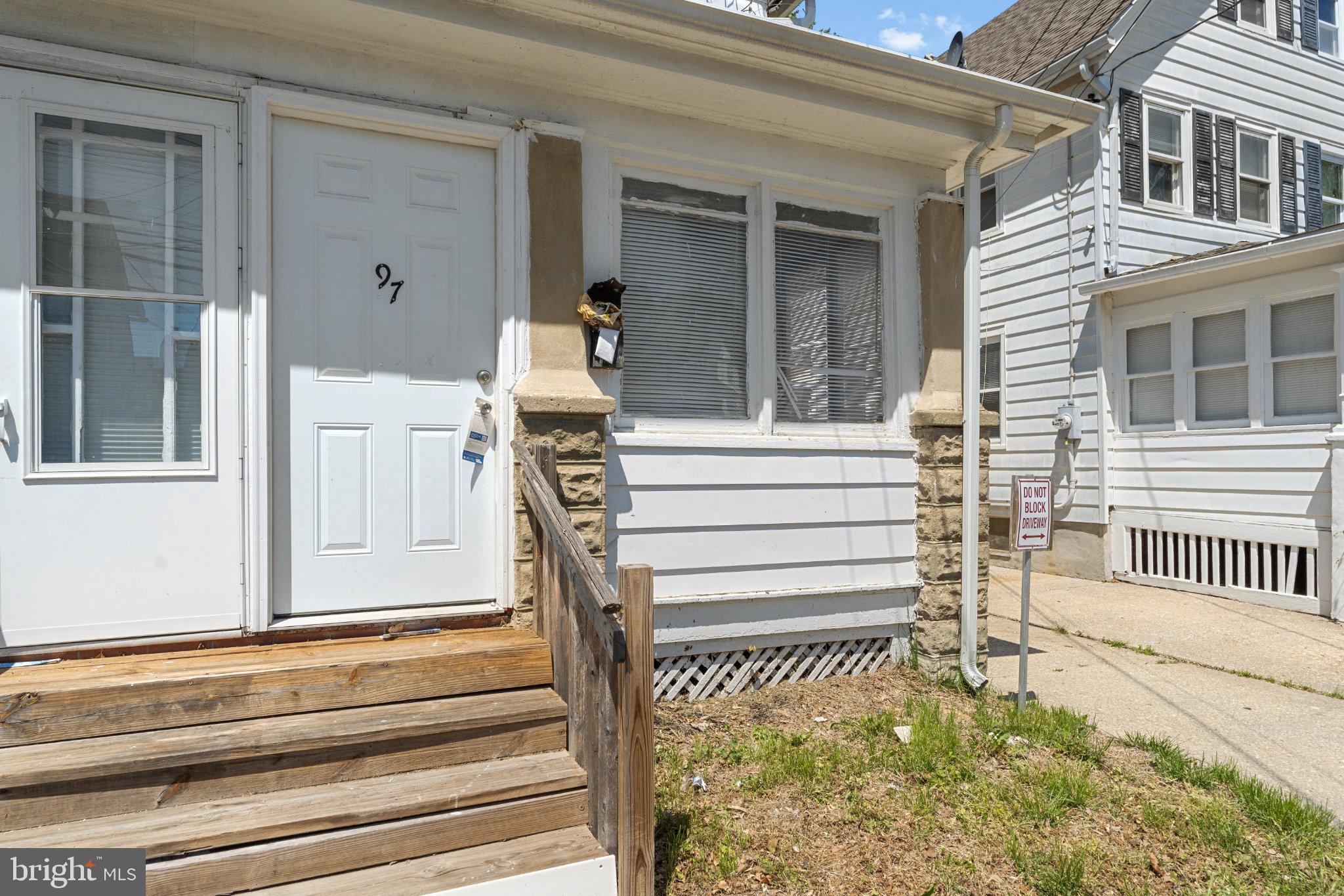 97 Chestnut Street Salem, NJ 08079 - Photo 2 of 38 a front view of a house with a window
